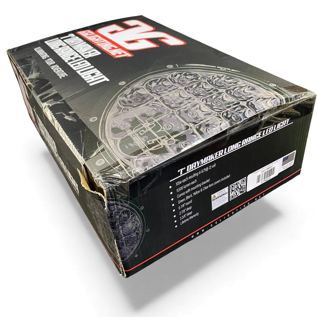 Product packaging with a clear window showing a detailed design, on a white background